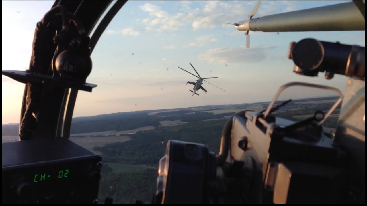 Mi-24 Hind combat maneuvering formation flying from cockpit view