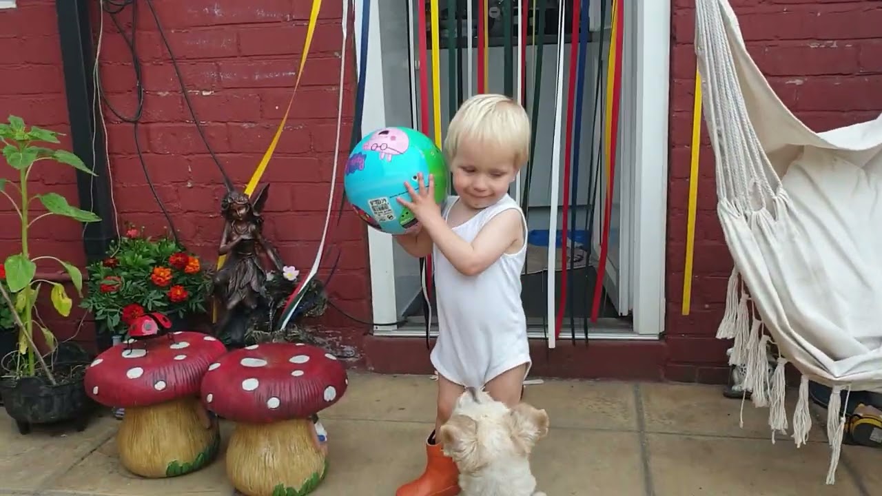 George plays with Teddy