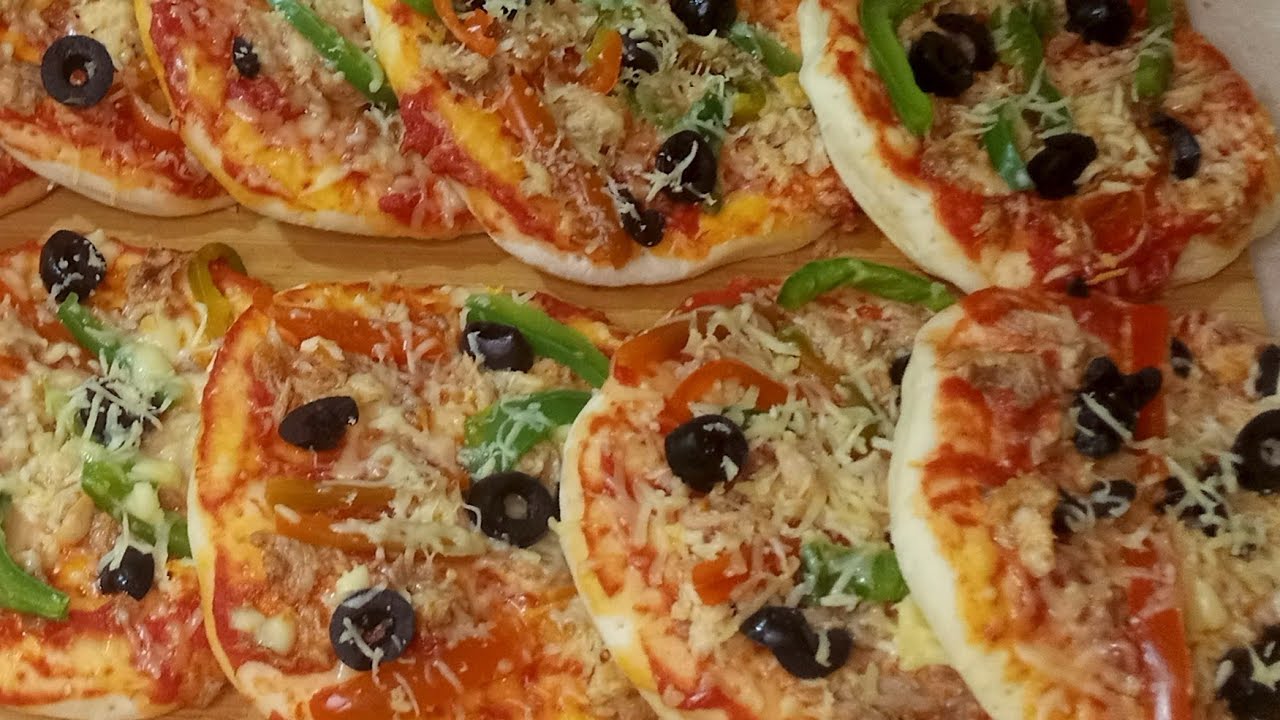 بيتزا بحجم صغير رمضانية 🌙 خطيرة ضروري تجربتها بهد ه الطريقة كتجي هشيشة ولذيذة 😋😋