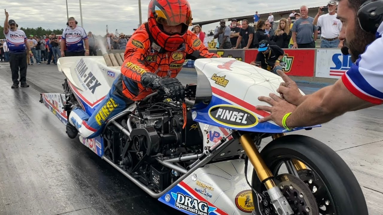 TOP FUEL MOTORCYCLE NEARLY SMASHES INTO WALL!