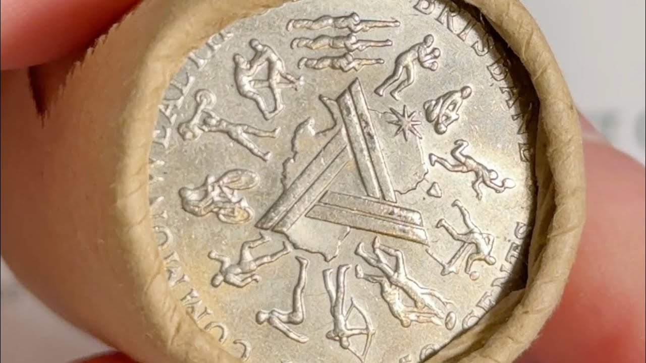 Что это такое? Это монета в 50 центов 1982 года, посвященная Играм Содружества &mdash; присоединяйтесь ...
