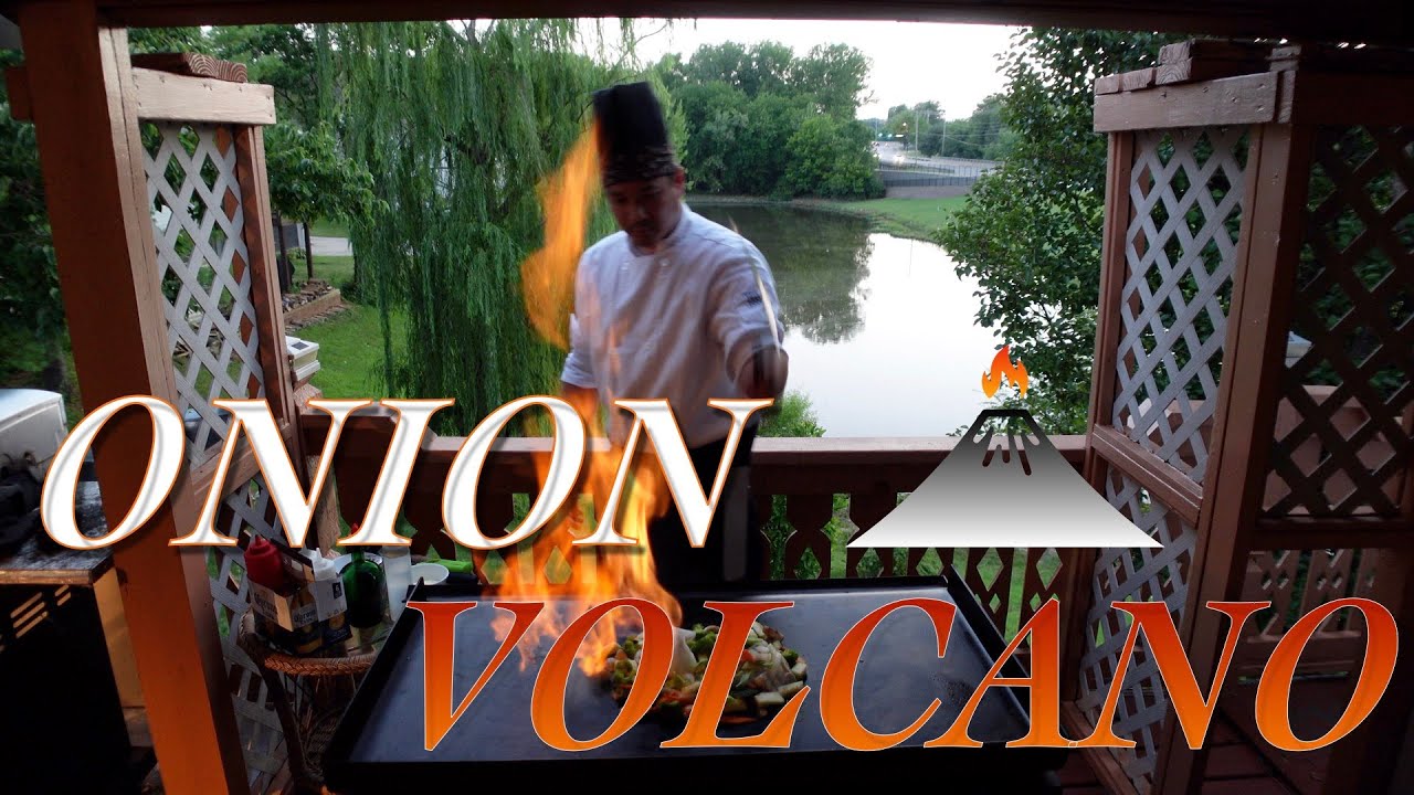 Pro Hibachi Chef makes onion volcano on Blackstone griddle | How to cook and prep Hibachi Vegetables