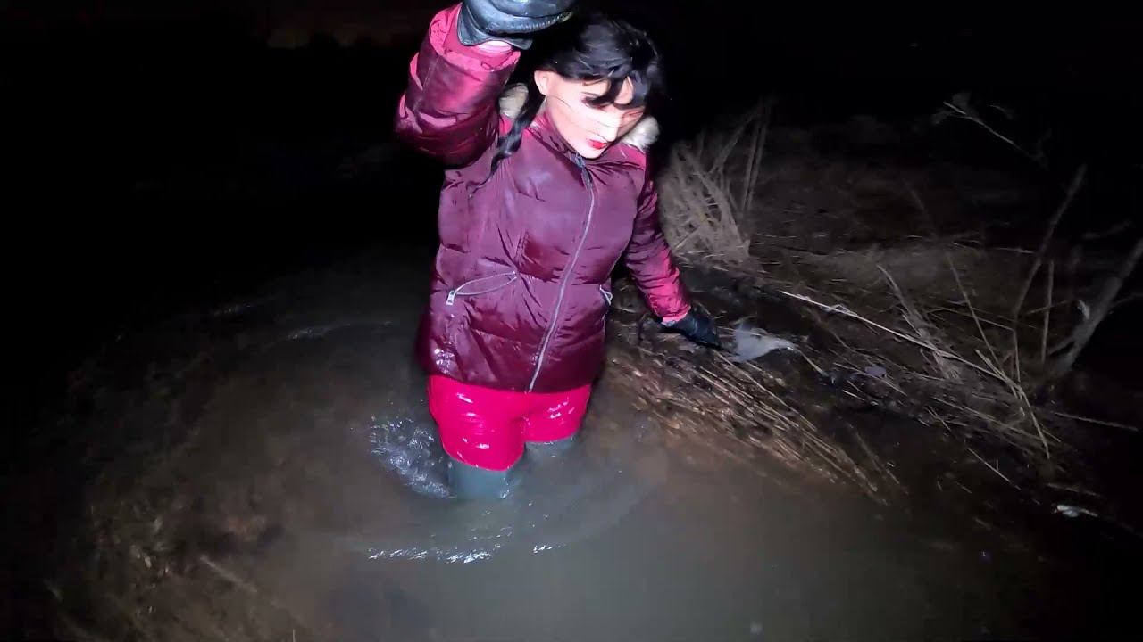 WetLook 223 girl in waders and snobord pants in deep water
