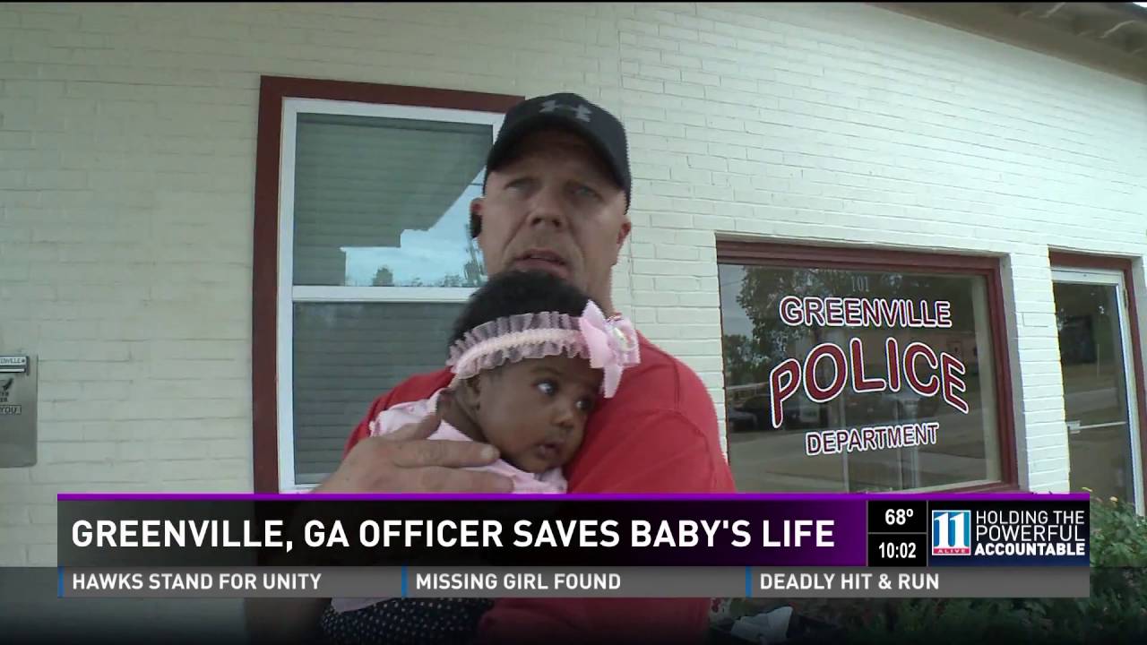 Police Officer now Godfather of Baby he saved