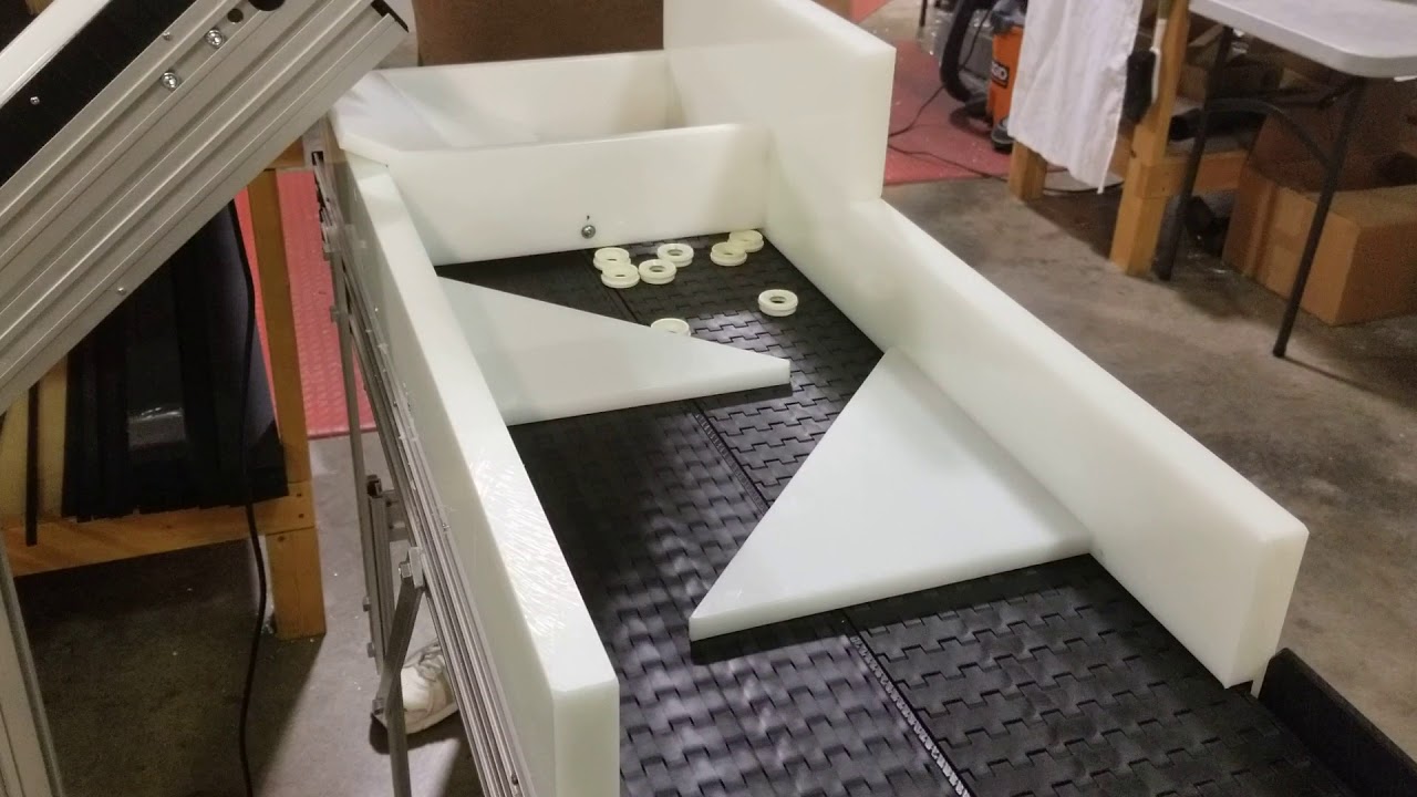 Dual Path Conveyor used to Singulate parts for inspection