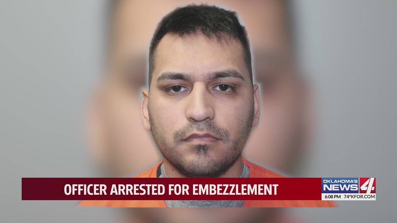 Officer arrested for embezzlement