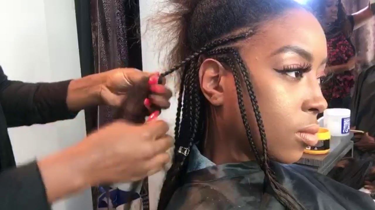 FULANI Braids by a fulani on a fulani /also called TRIBAL BRAIDS