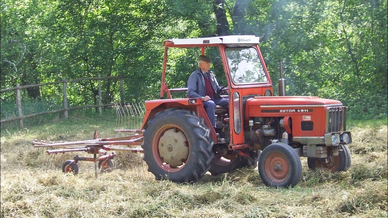 Classic Zetor 4911 turning hay in south west France 20 years ago with Kuhn single rotor Gyrorake