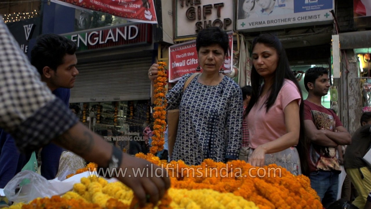 Buying flowers for Diwali at Malviya Nagar market in Delhi