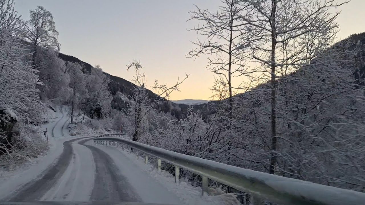 FV5386 from Palmafossen to Mjølfjell on a road of ice dusted with snow. Sunrise early winter drive.