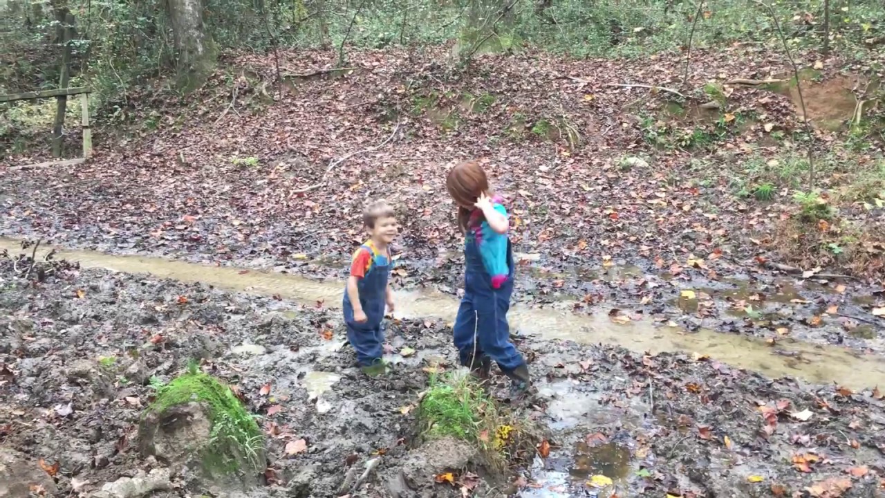 Kids stuck in the mud. Ella falls in mud and cow poop trying to get Caleb’s boots