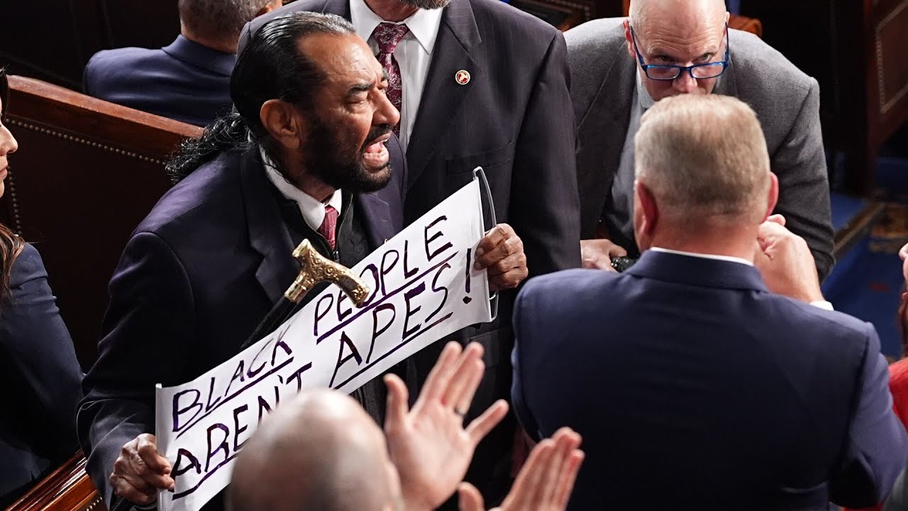 Al Green kicked out of Trump speech for waving 'Black people aren't apes' sign