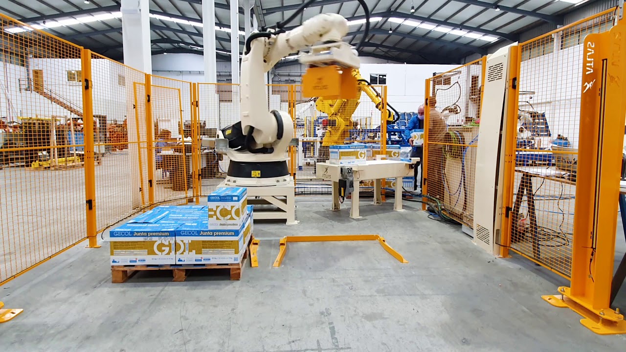 Automatic cell with reconditioned KUKA robot and two palletizing docks