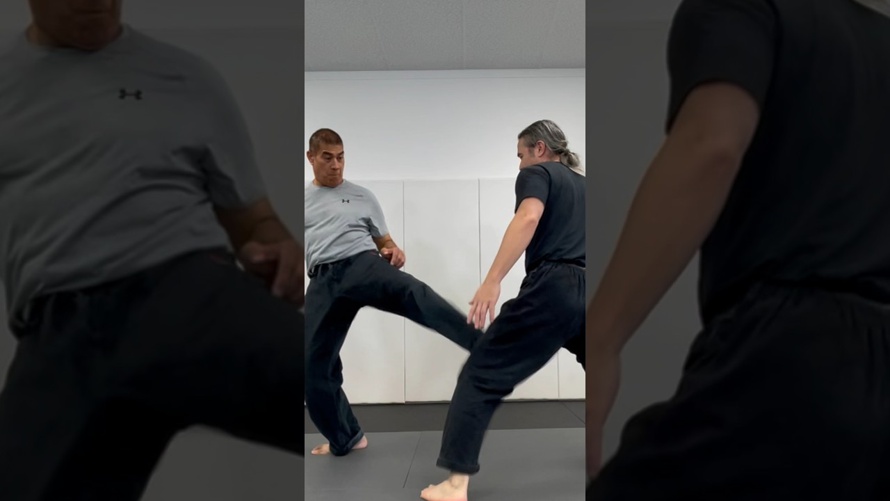 Learning how to strike an oncoming kick. Not intending to use it; prepared if needed. 