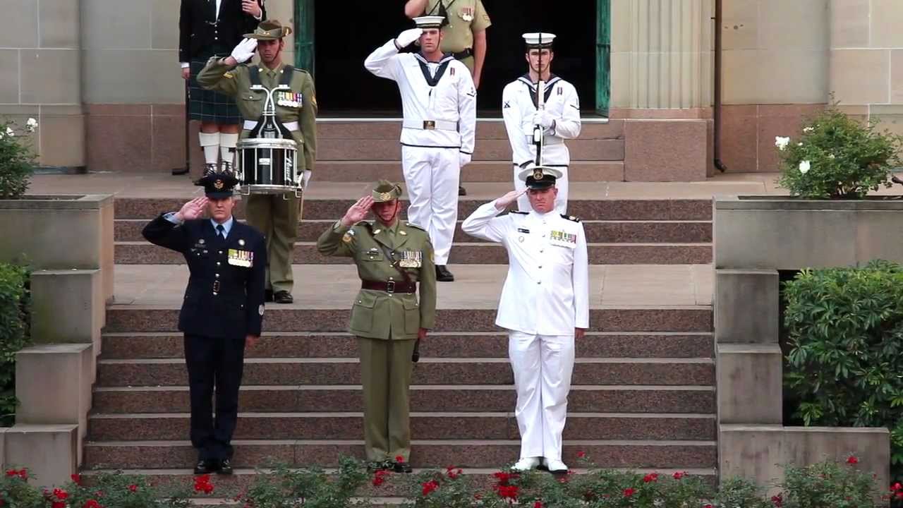 The AFG and Warrant Officers form Navy, Army & Air Force at the day's closing ceremony of the AWM