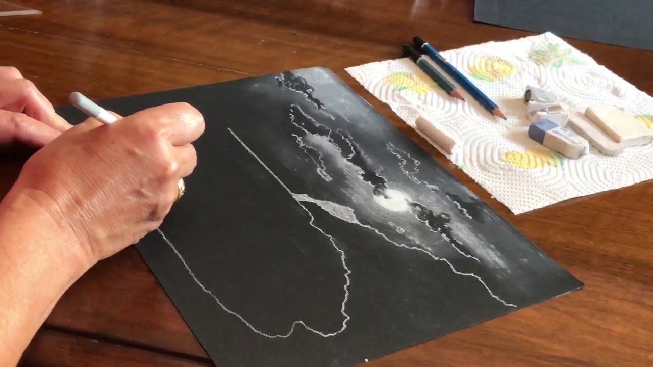 Gessetto bianco su foglio nero