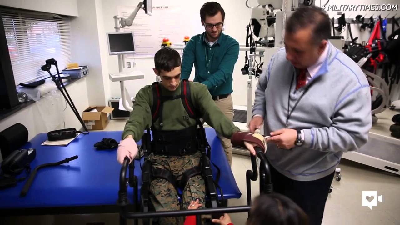 Paralyzed Marine walks again with robotic exoskeleton