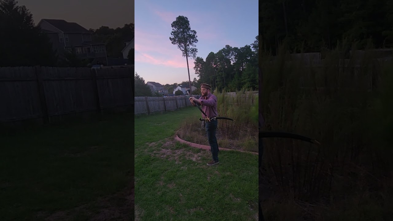 Shooting arrows and drawing a qaddare sword #shorts