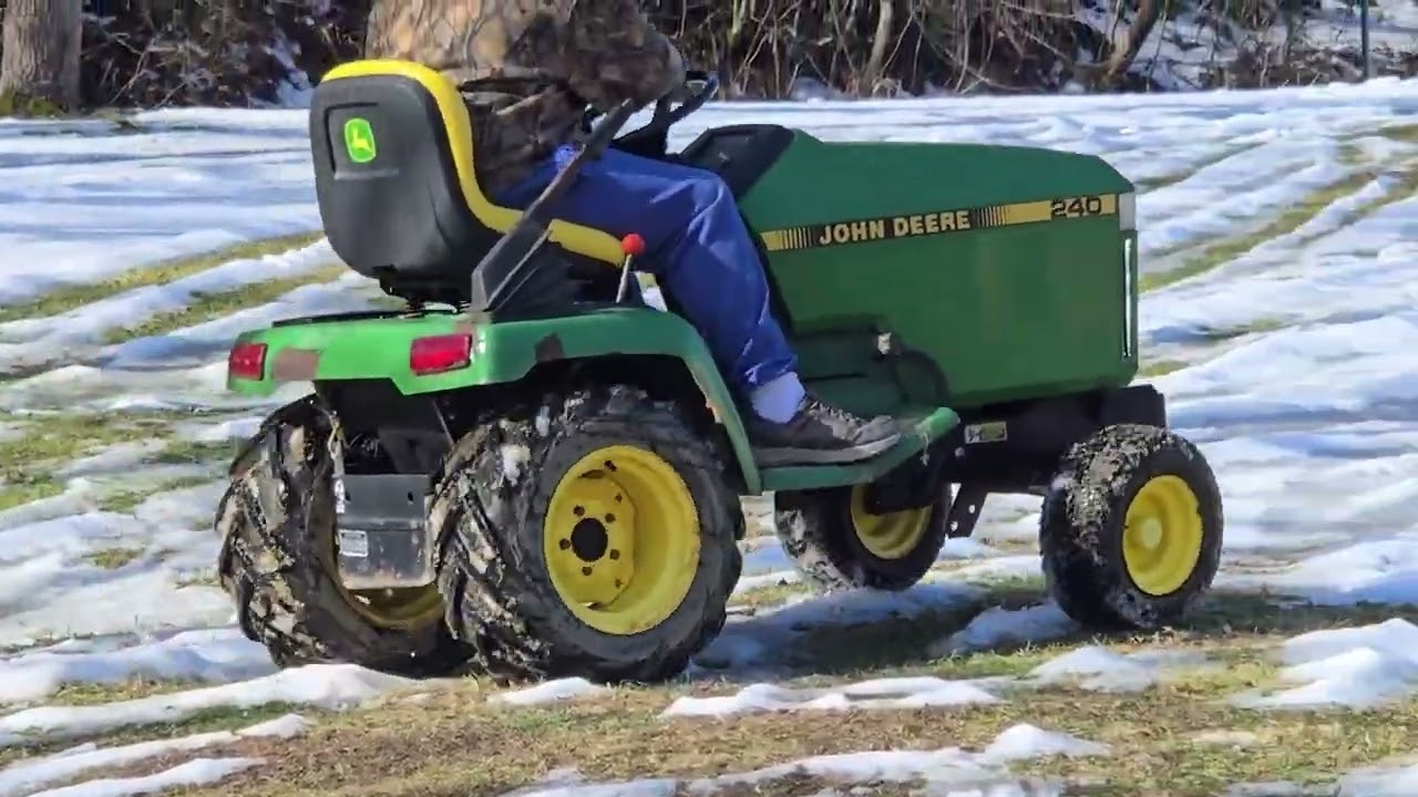 Riding JD 240 in the Yard
