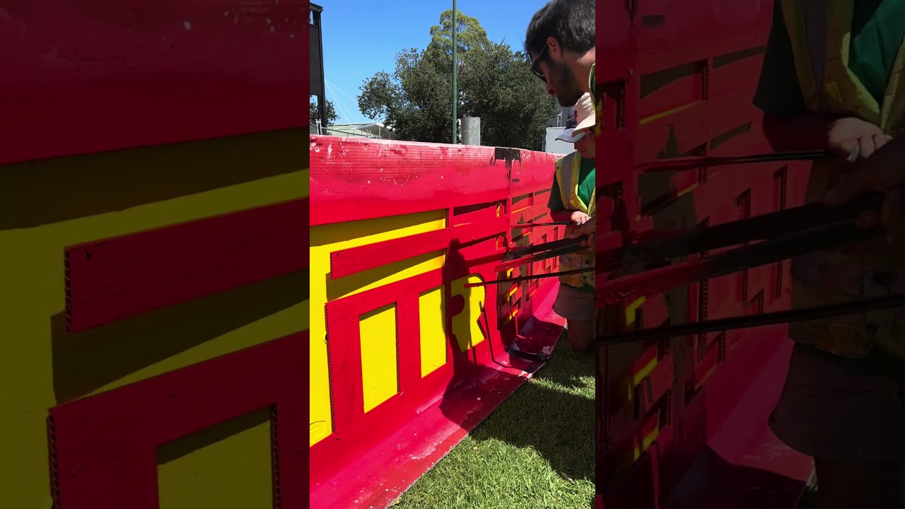 Painting the Pirelli barriers at Albert Park #Shorts #F1 #AusGp