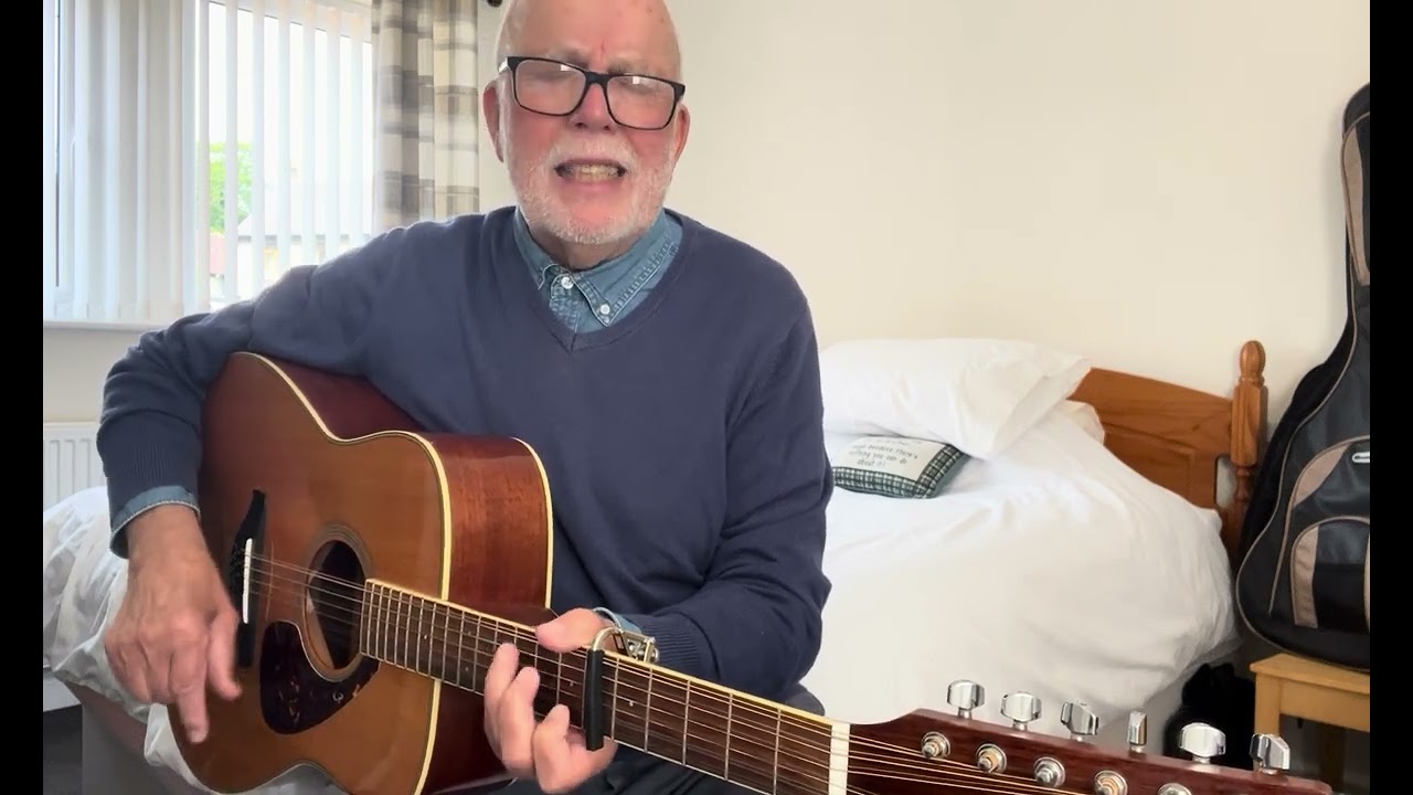 Robin Rendell’s The Poet On The Corner With A Guitar