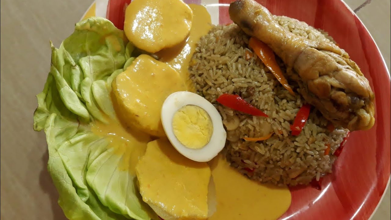 Arroz con pollo y papa a la huancaina