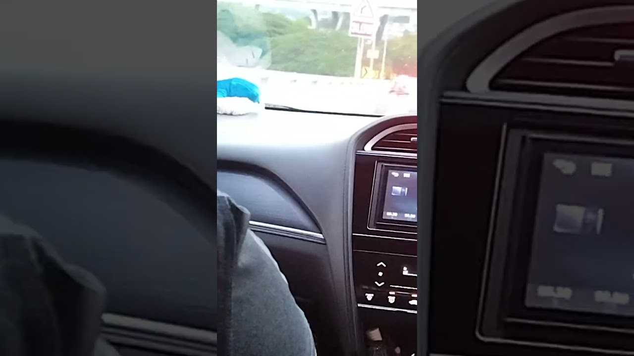 Driving on roads of Singapore in a rainy day 