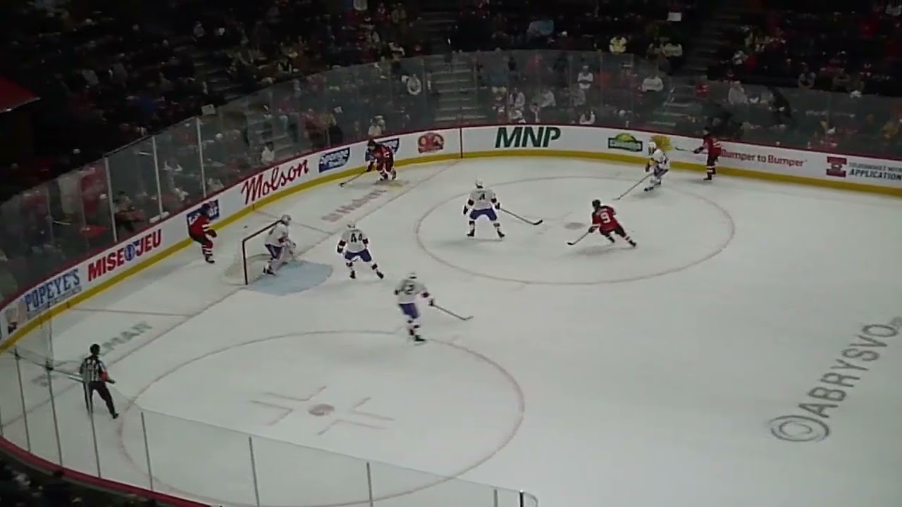 Utica Comets' Nico Daws makes a breakaway save vs. Florian Xhekaj of the Laval Rocket 1/2/26