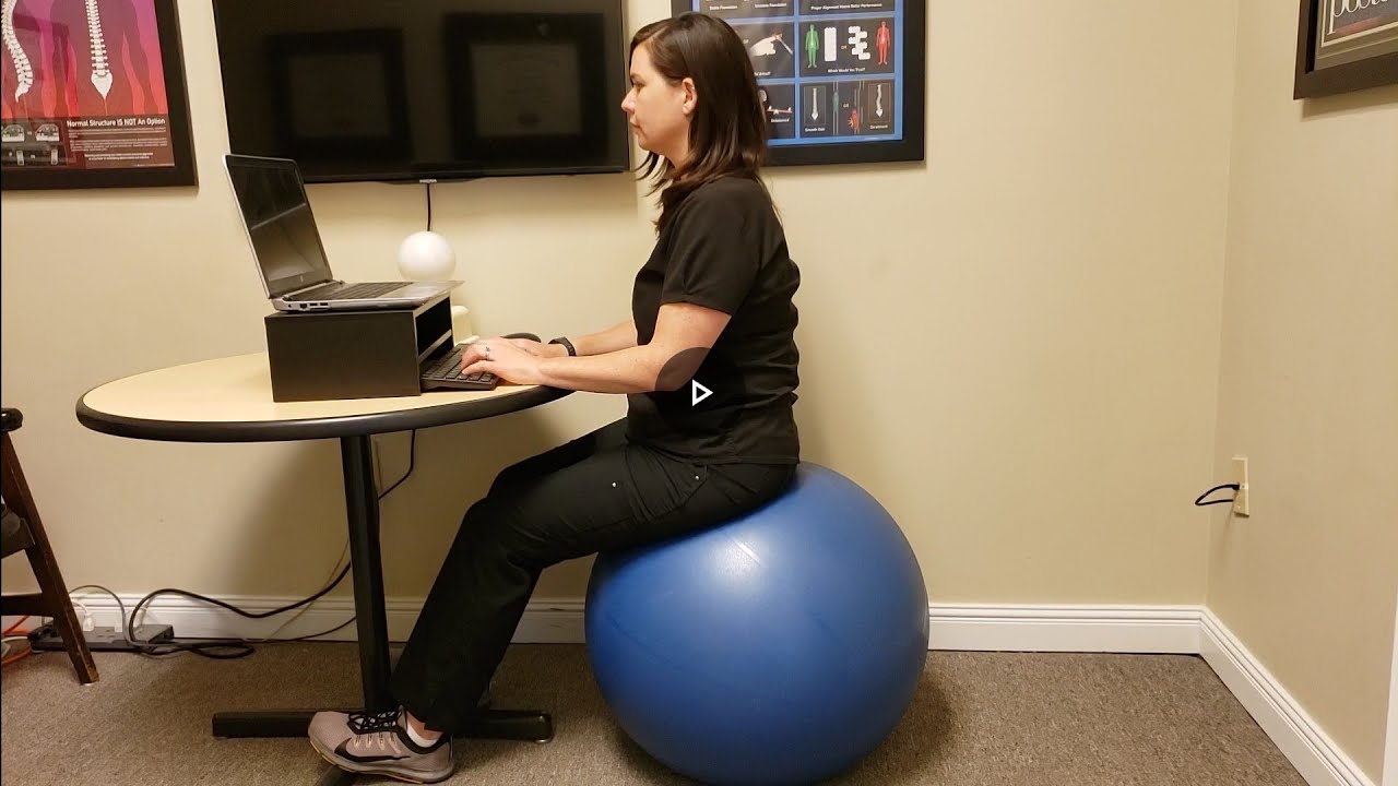 How to properly sit on a ball at work.