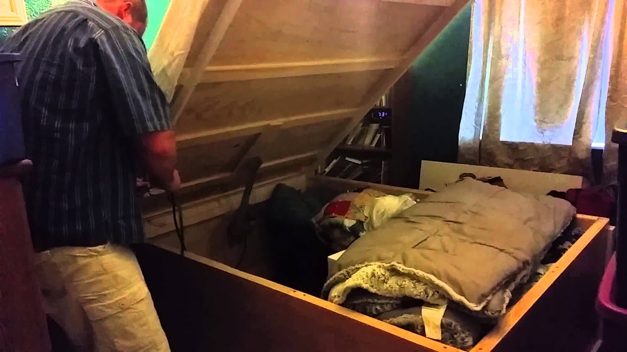 Storage bed with electric lift