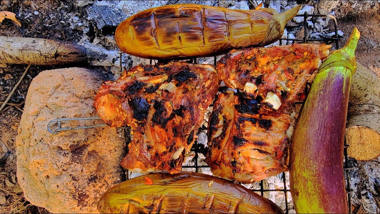 Roasted beef ribs with mushrooms in the forest