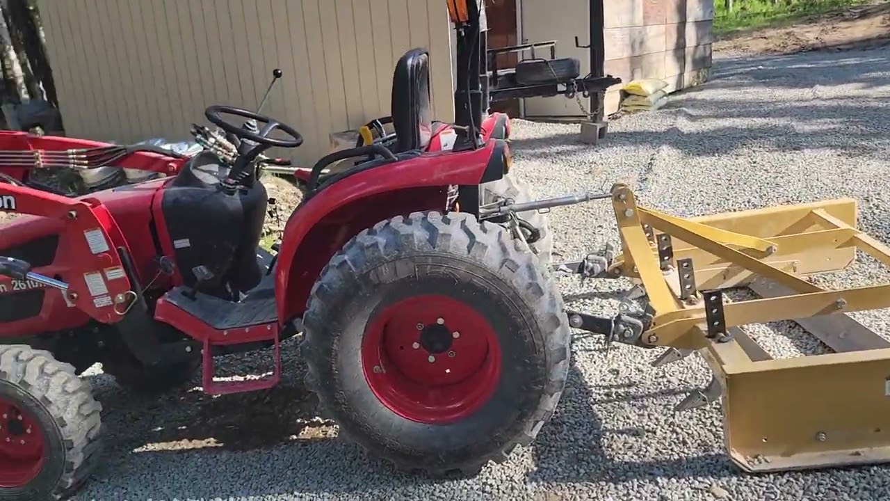 Branson 2610H lift capacity....maybe...and spreading gravel