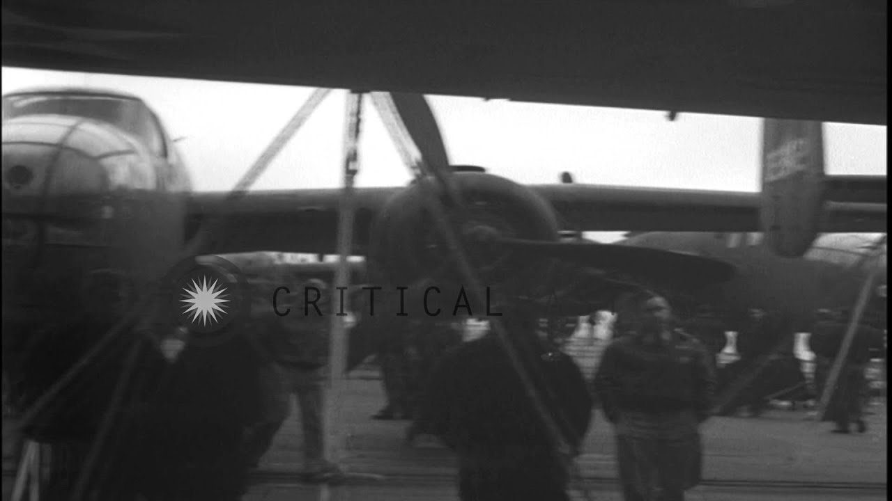 Doolittle Raid:  Scenes on the deck of USS Hornet and pilots under the wing of a ...HD Stock Footage
