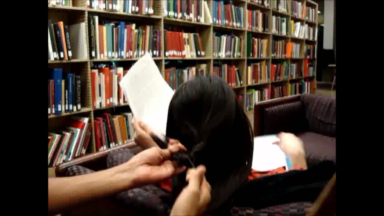 playing with her hair