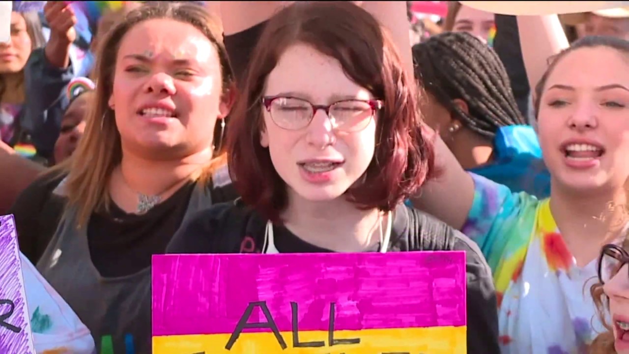 Crowd Rallies Outside Catholic School in Washington After Gay Teachers Resign