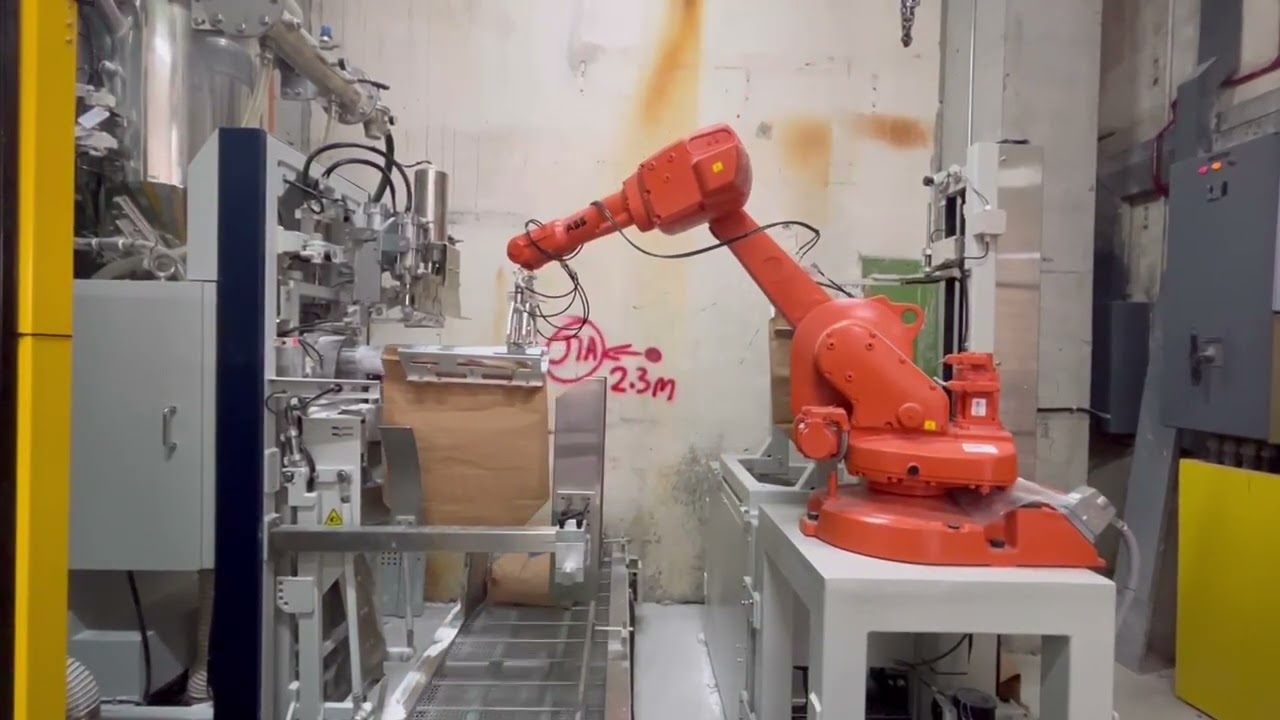 Robot type automatic valve bag placer