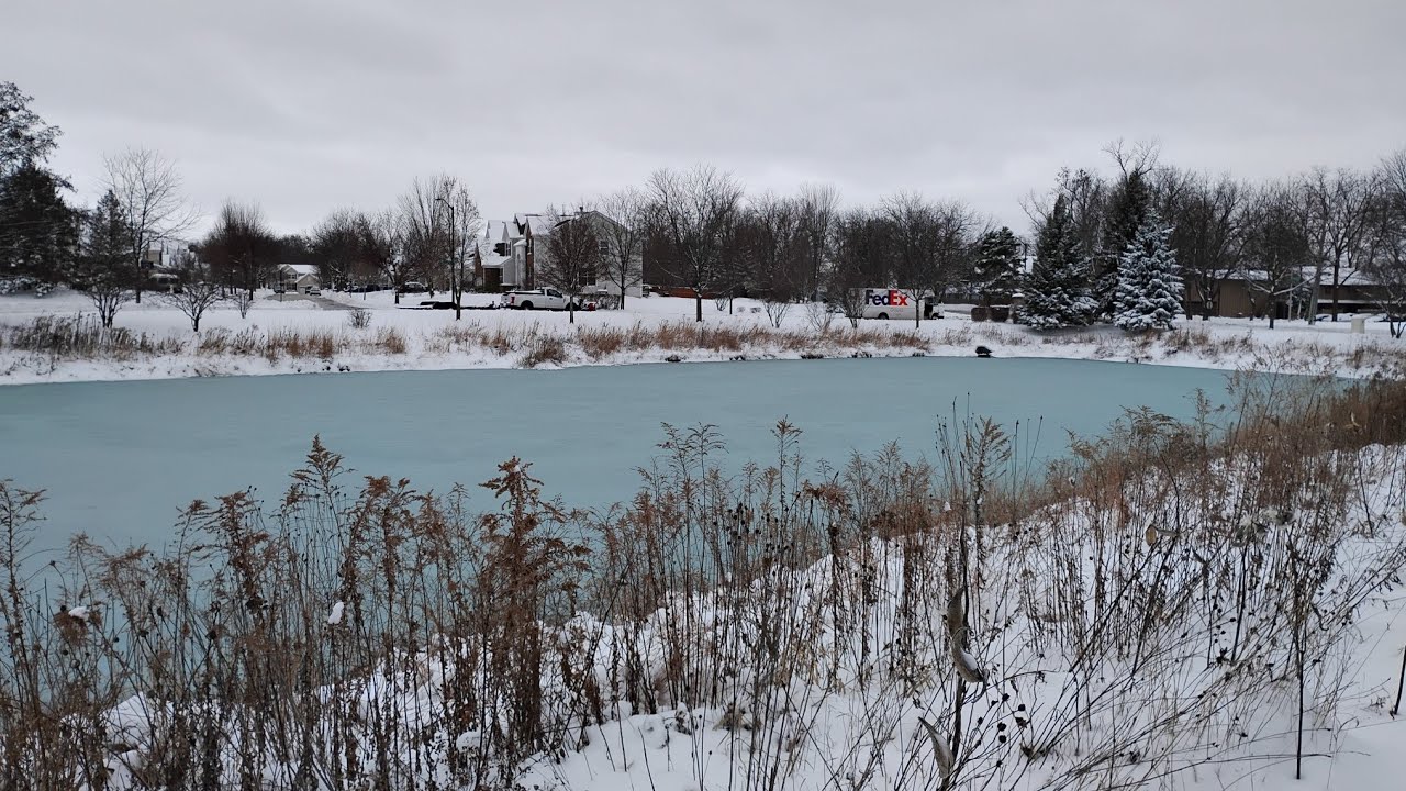 Pretty ice blue pond after heavy snowfall in Illinois (2025) | nature in winter time