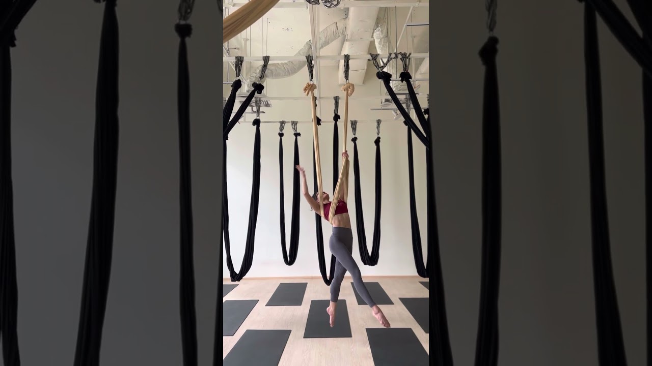 Aerial yoga hammock flow crossback straddle