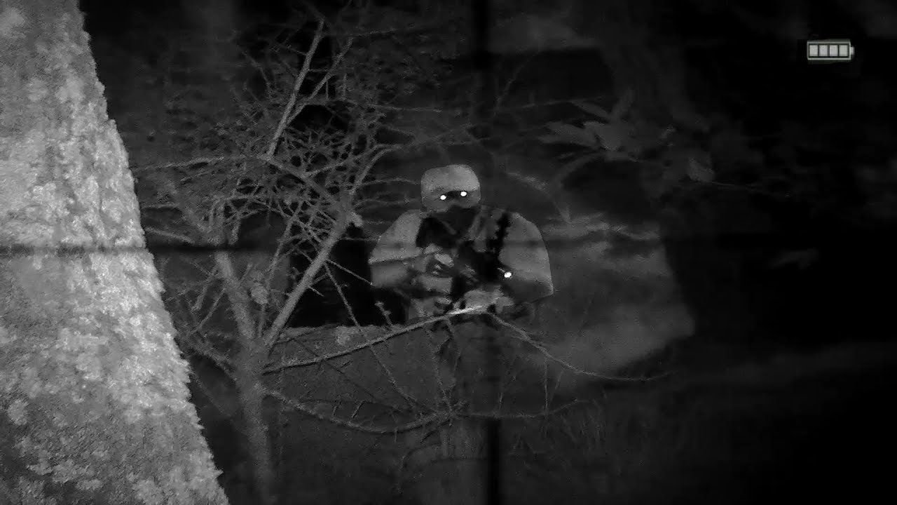 MAN HUNTING with night vision device NVG and sniper rifle