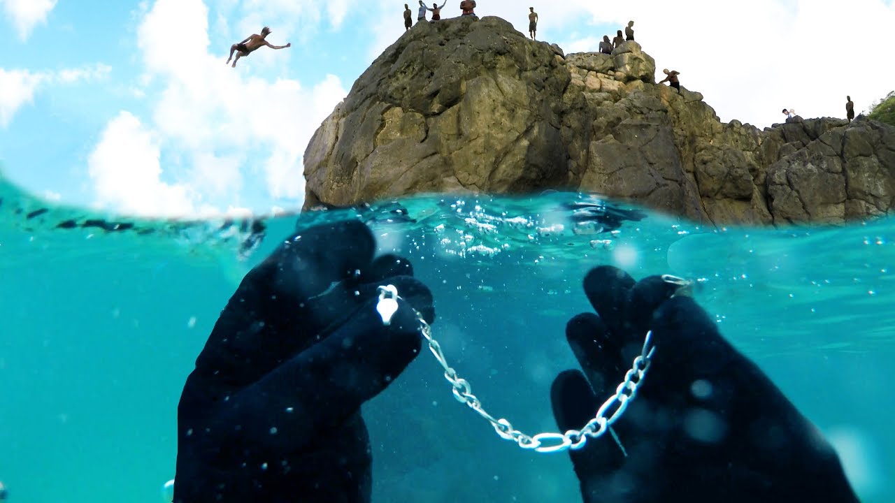 What's Buried Beneath Hawaii's Busiest Cliff? (Underwater Metal Detecting)