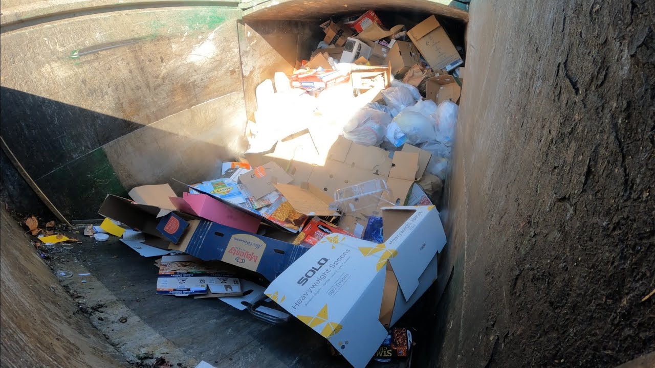 Inside view Waste Management front load garbage truck 