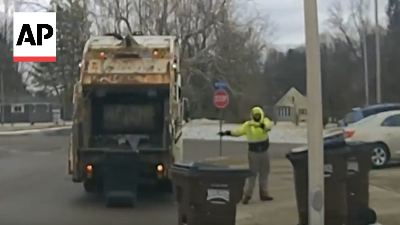 Ohio police chase suspect after sanitation worker finds him in a trash can