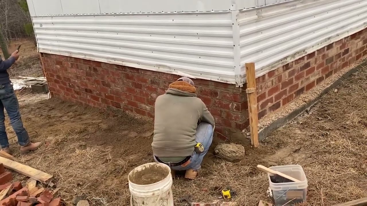 Putting In Brick Skirting Around The Bottom of A Mobile Home - Part FOUR!  Another Brick In The Wall