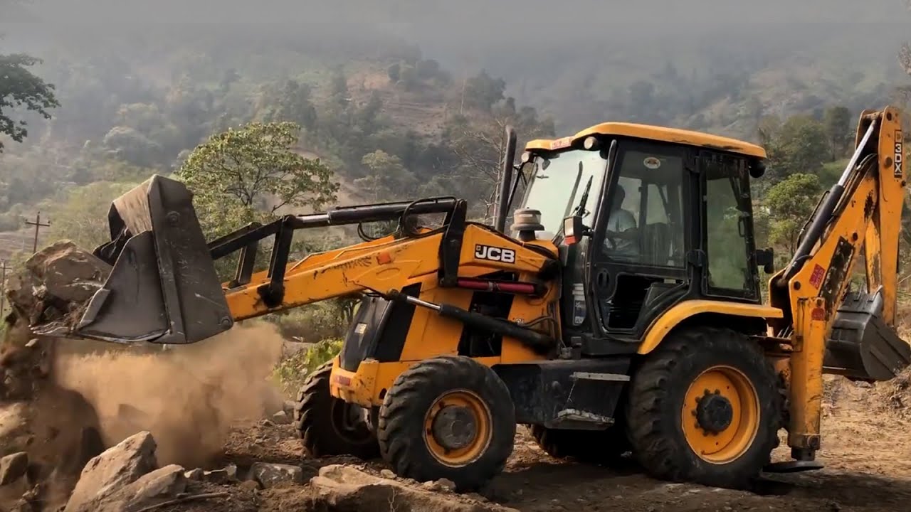 JCB Backhoe 3DX Machine Working Hill Land - JCB Pulling Out Stones Hilly Field 2