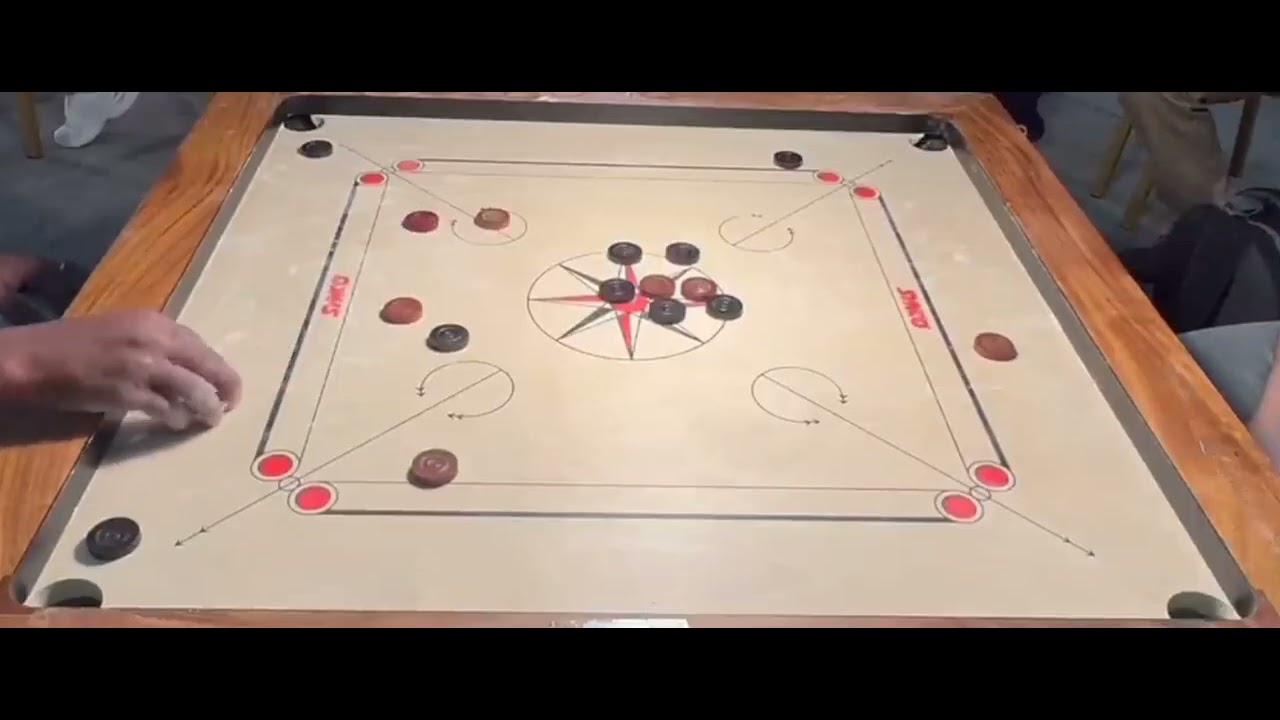 The most challenging, standard game played by two players on a carrom board