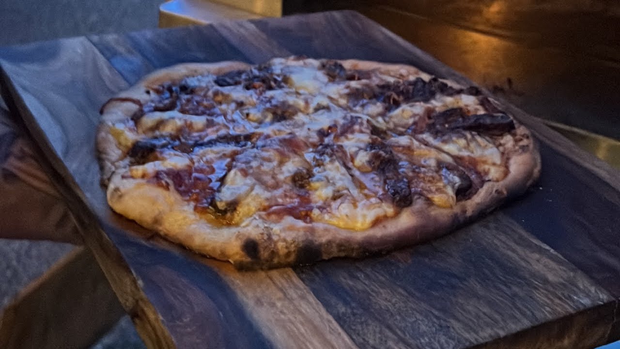 Dude Food Fire's Signature Cheesesteak Pizza