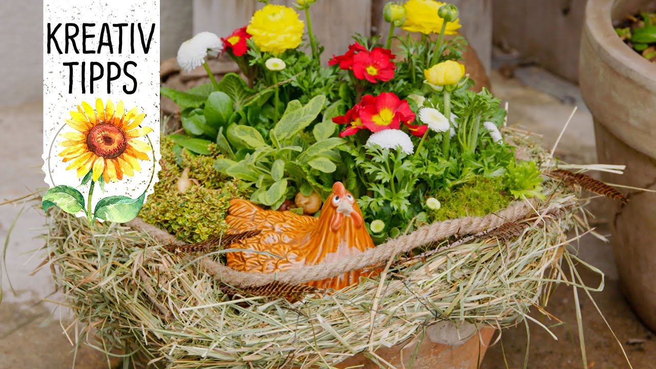 Farbenfrohe Osterdekoration mit Frühlingsblumen für den Balkon - Volmary® KreativTipp