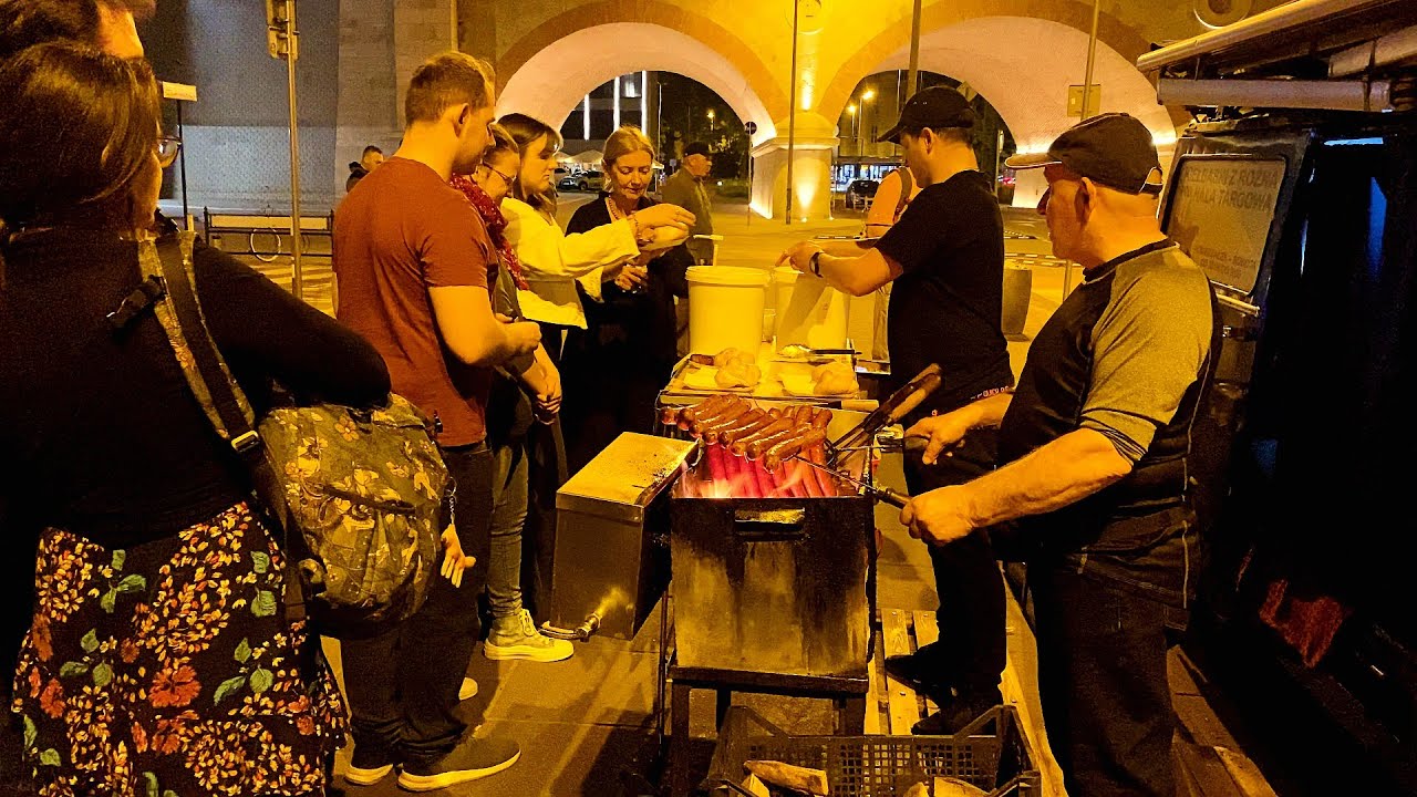 Street food in Krakow. Grilled sausages from Nysa Blue near the Market Hall