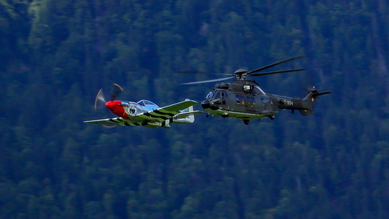 P-51 Mustang Formation Flight with A&eacute;rospatiale AS 332 Super Puma Helicopter