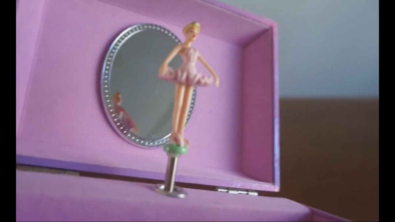 Play with the pink and purple MUSIC BOX with ballerina dancing on SWAN LAKE music